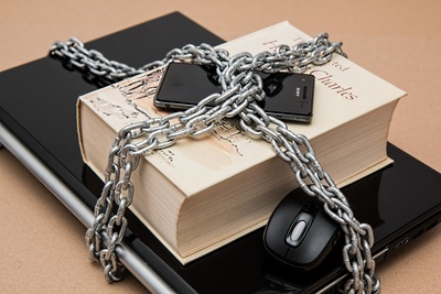 Laptop, Book, Phone in Chains